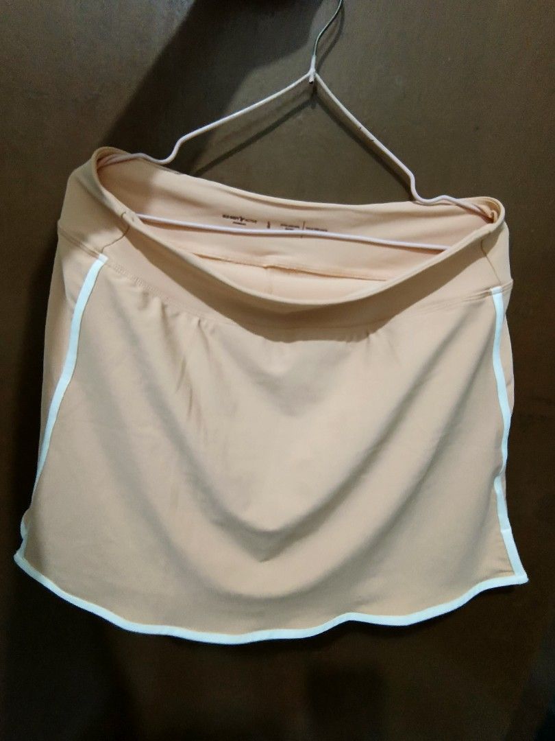Old Navy Active Skirt - Size L (Category: Skirts) located in Manila. Submitted by Prea_G (Listing ID 1413754486, Image 1). Description: -Old Navy Active skirt in peach with white trim. -Size Large. -Built-in short. -Perfect for sports. - Comfortable and breathable..