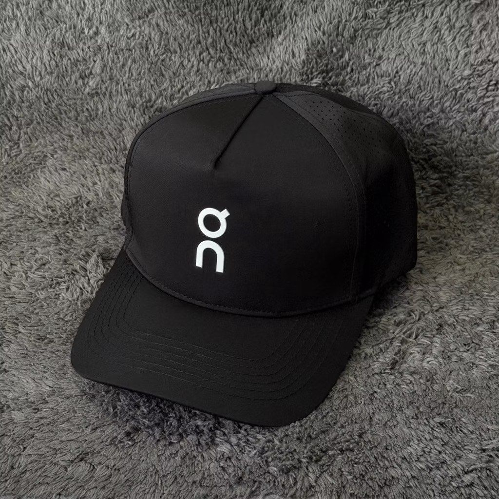 On Running Cap (Category: Caps & Hats) located in Manila. Submitted by useyourcommonsense (Listing ID 1413748176, Image 1). Description: - On Running cap - Available colors: Black, White, Blue, Gray - Features brand logo - Curved brim - Perforated side panels for breathability - Ideal for running and everyday use.