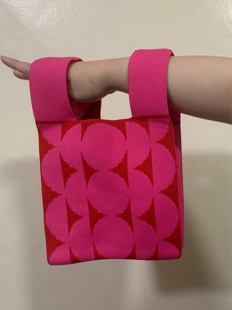 Pink Knit Bag (Category: Purses & Pouches) located in Quezon City. Submitted by closet.decluttered (Listing ID 1413836123, Image 2). Description: Tight knit pink and red bag Bag itself is 8 inches by 8 inches, measurement including straps is 8 inches by 13 inches Location is Balintawak Quezon City Payment is via Gcash or BDO Shipping is via J&T Express or Lalamove/Grab.