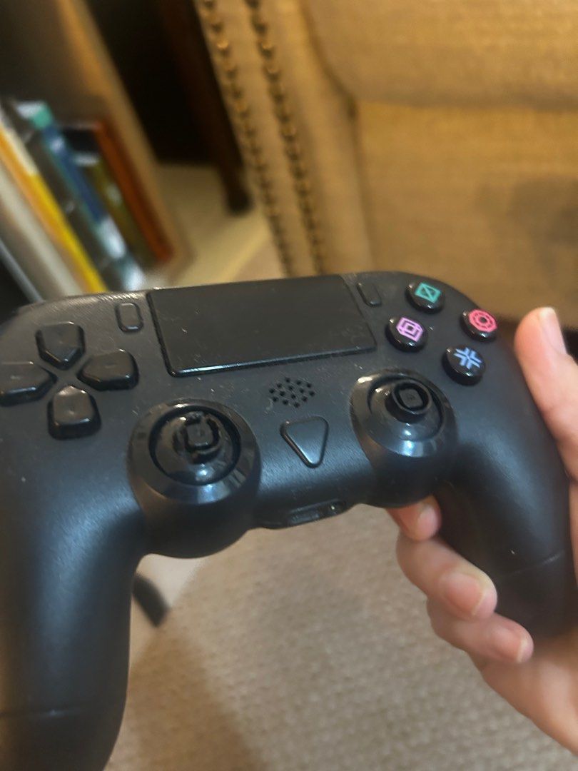 Ps4 controller (Category: Controllers) located in Taguig. Submitted by uniquefindsmnl (Listing ID 1413705033, Image 1). Description: Working fine 2 knobs got removed .