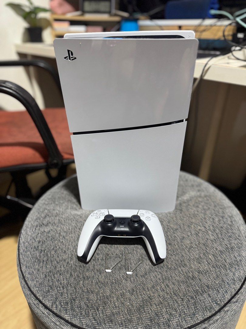 PS5 Slim 1TB with 1 dualsense controller + 3 CD games (Category: PlayStation) located in Pasig City. Submitted by robbiseraphin (Listing ID 1413797711, Image 3). Description: 🏷️ Selling: PlayStation 5 Slim 1TB 🚐 Items are in Pasig. Available for pickup or lalamove delivery! Working with no issues - test all you want! 📍 Meetups: SMDC Shine Residences Meralco Avenue Pasig city, or 30th Ayala Mall 🎮 Includes: - Ps5 slim Unit - 1 dualsense Contro