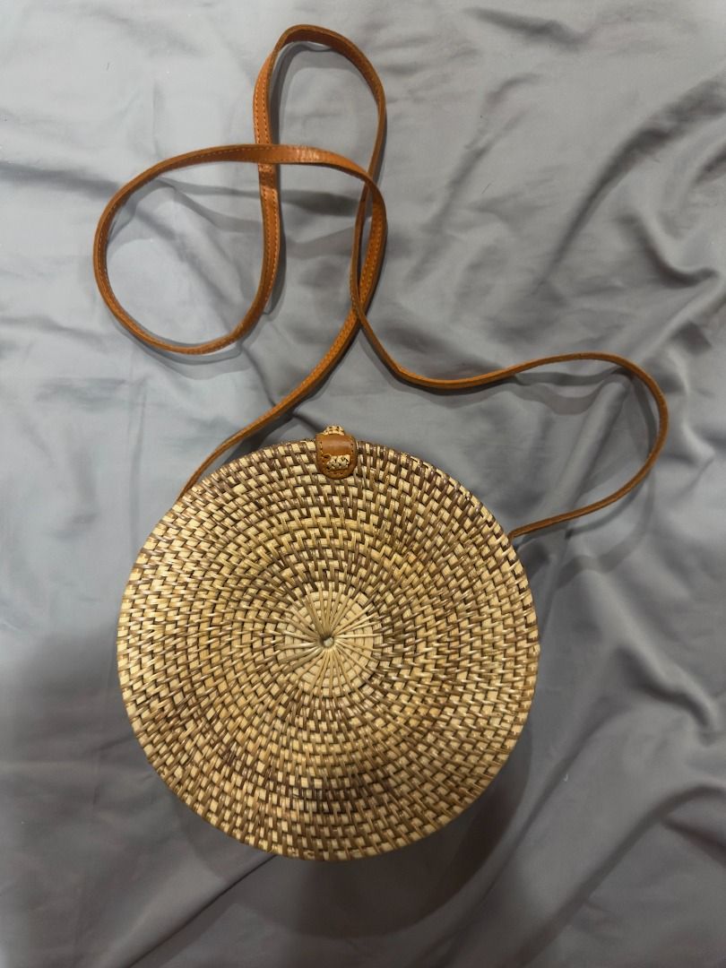 Round Woven Rattan Bag with Leather Strap (Category: Cross-body Bags) located in Manila. Submitted by jmacg (Listing ID 1413744454, Image 1). Description: What you see is what you get Shipping ℅ buyer.