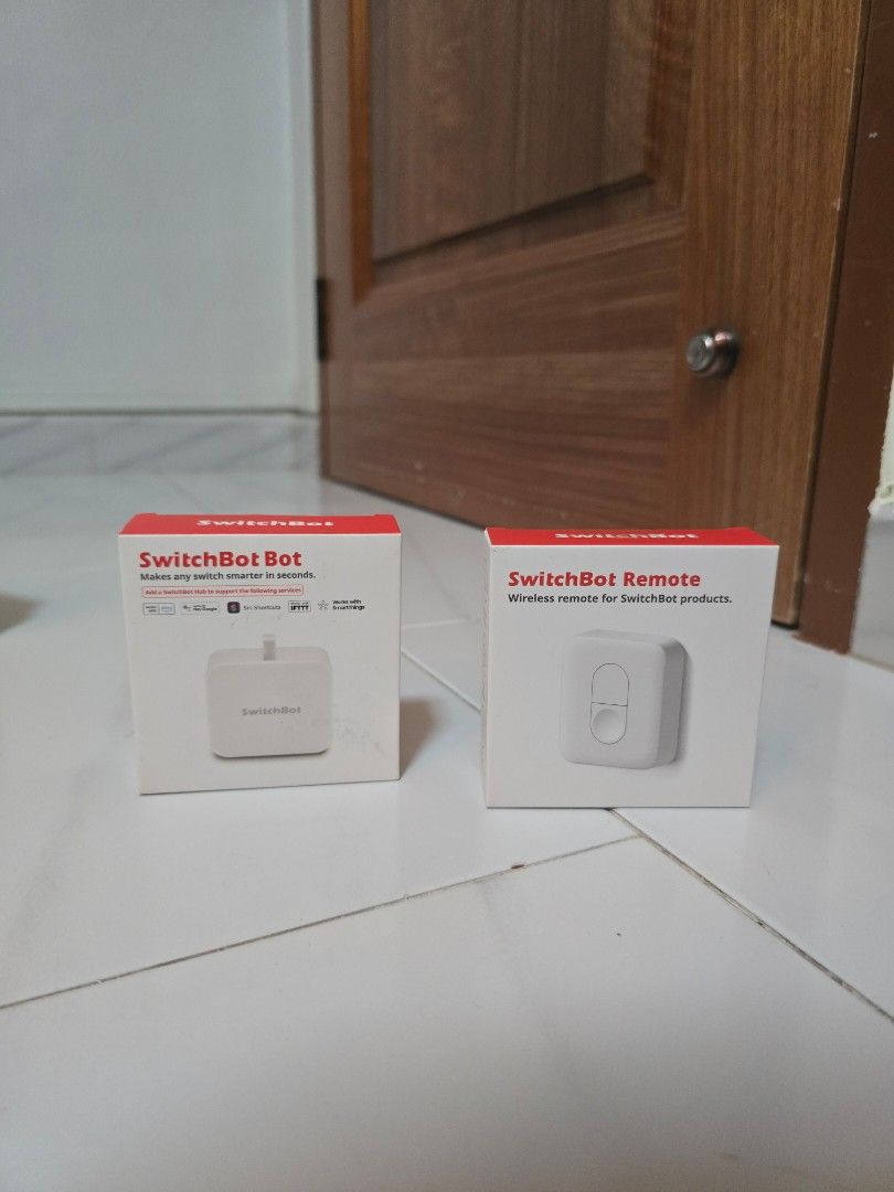 SwitchBot Remote & Bot - Wireless Control (Category: Entertainment Systems & Smart Home Devices) located in Singapore. Submitted by bbuysellbyee (Listing ID 1413813243, Image 1). Description: Selling a pair of SwitchBot devices: a Remote and a Bot. Both are used lightly and in their original packaging. The Remote is a wireless remote for SwitchBot products, and the Bot automates button presses. Perfect for smart home enthusiasts!.