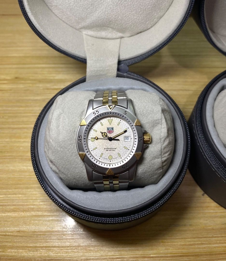 Tag Heuer 1500 Series Watch (Category: Luxury Watches) located in Quezon City. Submitted by theafterdark (Listing ID 1413746458, Image 1). Description: - Tag Heuer 1500 Series watch - Silver and gold-tone design - Round face - Stainless steel and gold-tone bracelet - Comes with original case - Date display - Luminous hands and markers -Quartz -Dive watch -Rare Vintage -with extra links No issues AUTHENTIC .