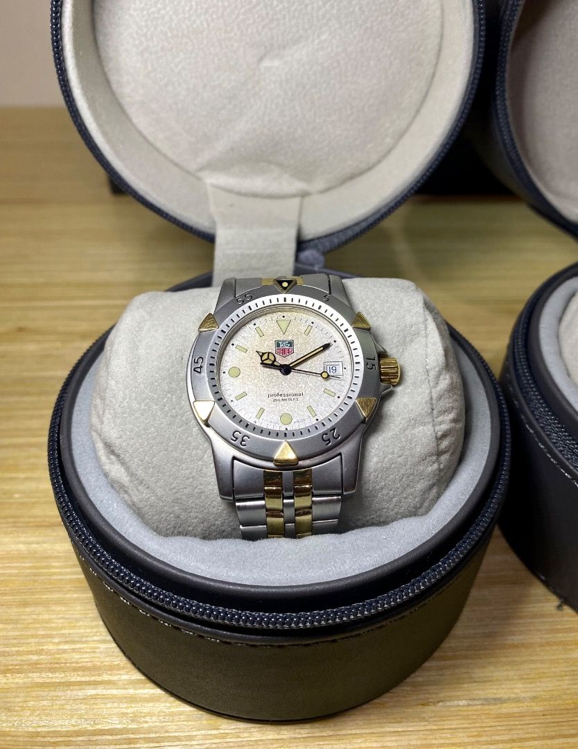 Tag Heuer 1500 Series Watch (Category: Luxury Watches) located in Quezon City. Submitted by theafterdark (Listing ID 1413746458, Image 2). Description: - Tag Heuer 1500 Series watch - Silver and gold-tone design - Round face - Stainless steel and gold-tone bracelet - Comes with original case - Date display - Luminous hands and markers -Quartz -Dive watch -Rare Vintage -with extra links No issues AUTHENTIC .