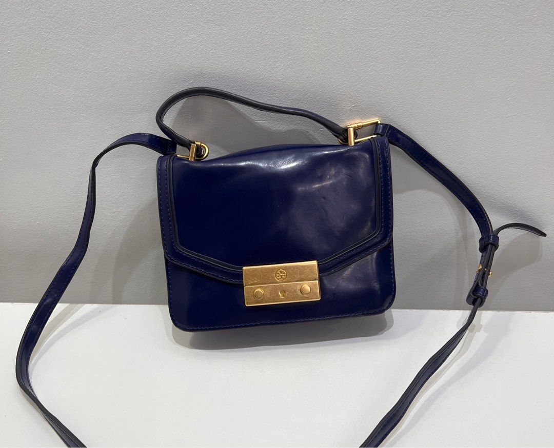 Tory Burch (Category: Luxury Bags & Wallets) located in Cebu City. Submitted by brandedcorner_ph (Listing ID 1413838941, Image 1). Description: Pre-loved (T)ory (B)urch Juliette Mini Top Handle Satchel 100% Authentic or money back Condition •Excellent condition •No flaws Product Details •Color: Blue •Hardware: Gold tone •Material: Leather •Approximate Dimensions in inches: H6 x W8 x D3 Color may vary due to lighting. PM for more photos Mine: 2,95