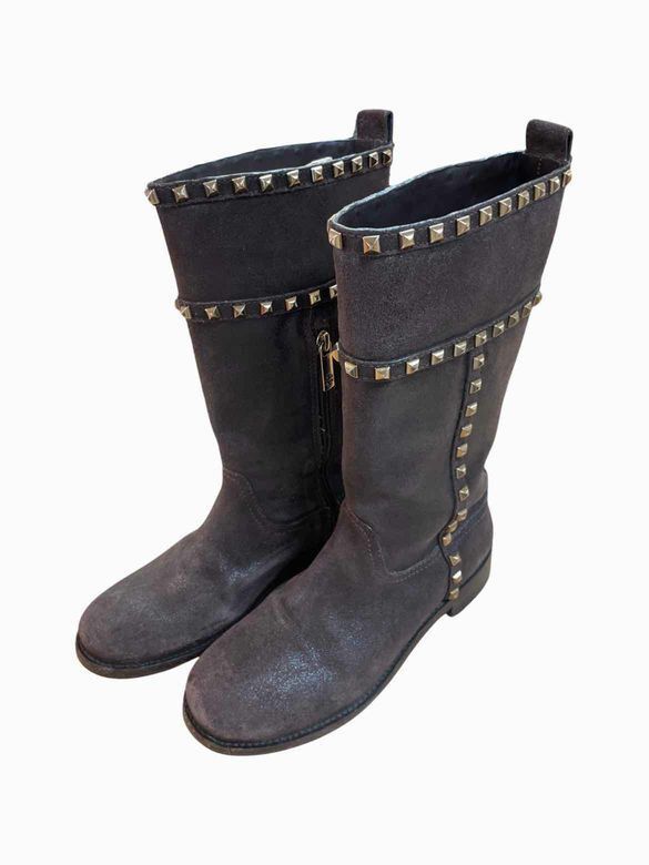 Tory Burch Shauna Boots (Category: Boots) located in Paranaque City. Submitted by MigsPPP (Listing ID 1413738287, Image 2). Description: - Black studded boots - Mid-calf height - Zipper closure - Textured appearance - Flat sole.