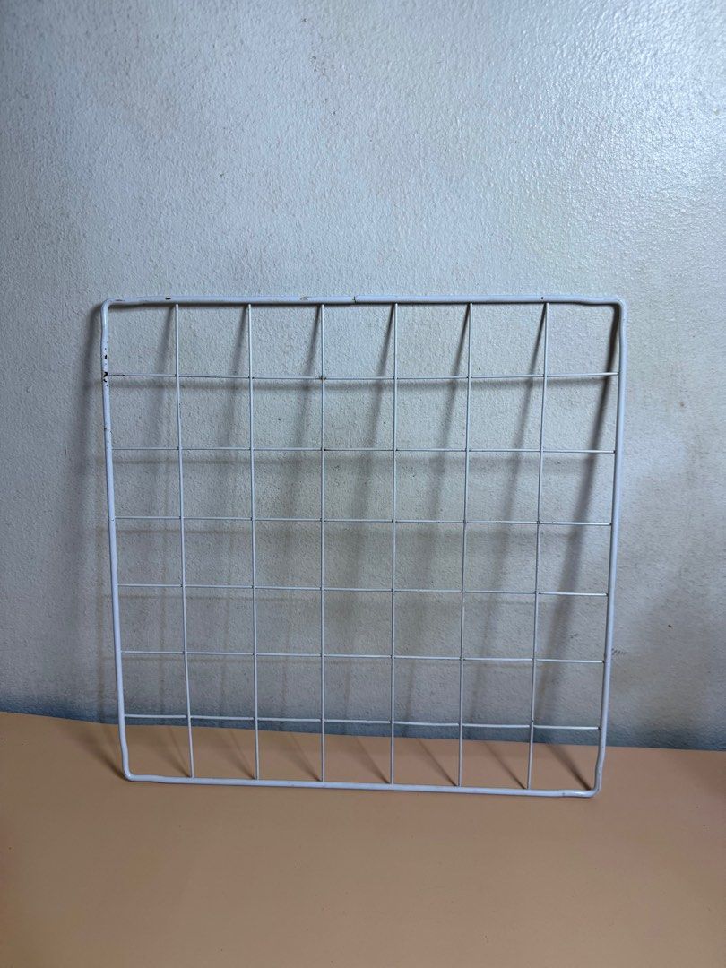 White Wire Storage Organizer (Category: Storage Boxes & Baskets) located in Pasig City. Submitted by chikaching (Listing ID 1413757597, Image 2). Description: - Set of white wire storage organizers - Includes multiple wire grid panels - Features a clear, square plastic panel with a white frame - Ideal for organizing items in your home or office - 15pcs mesh panel, 4pcs opaque panel, 1pc door mesh, 35 connector locks.