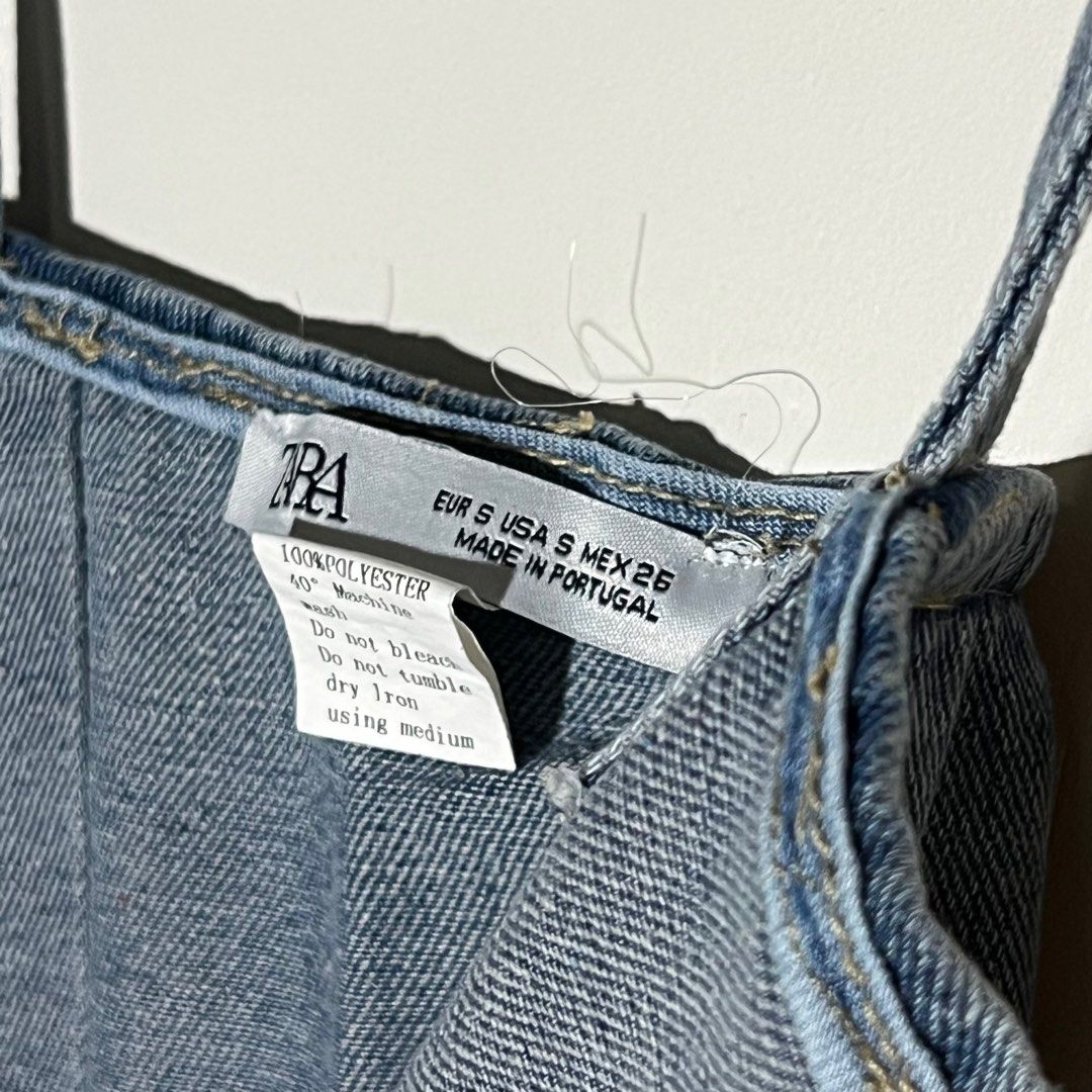 Zara One Shoulder Denim Dress (Category: Dresses) located in Paranaque City. Submitted by shopdeclutterfly (Listing ID 1413836613, Image 3). Description: BRAND: Zara BEST FITS: XS-S Message me for more information. Important Notes: — Color may vary slightly due to lighting and screen settings. — This is a preloved item. — Minor signs of wear may be present — There may be small stains, dots, or marks due to storage and previous use. — Please manag