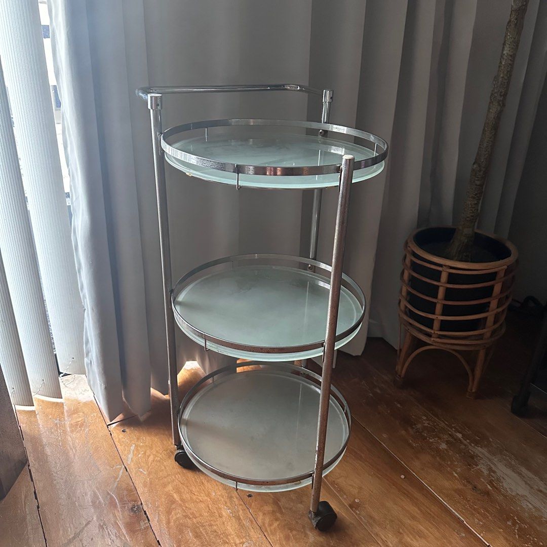 3-Tier Serving Cart with Glass Shelves (Category: Shelves, Cabinets & Racks) located in Antipolo. Submitted by fasph (Listing ID 1413948577, Image 1). Description: - 3-tier serving cart - Glass shelves - Chrome frame - Handle for easy maneuverability - Wheels for convenient movement - Shelf diameter: approx. 14inches - Height: approx. 28 inches - Perfect for serving or display.