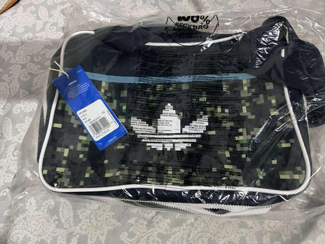 Adidas x Minecraft Airliner Bag (Category: Sling Bags) located in Pasig City. Submitted by ton14 (Listing ID 1413983332, Image 1). Description: Adidas x Minecraft Airliner Bag.