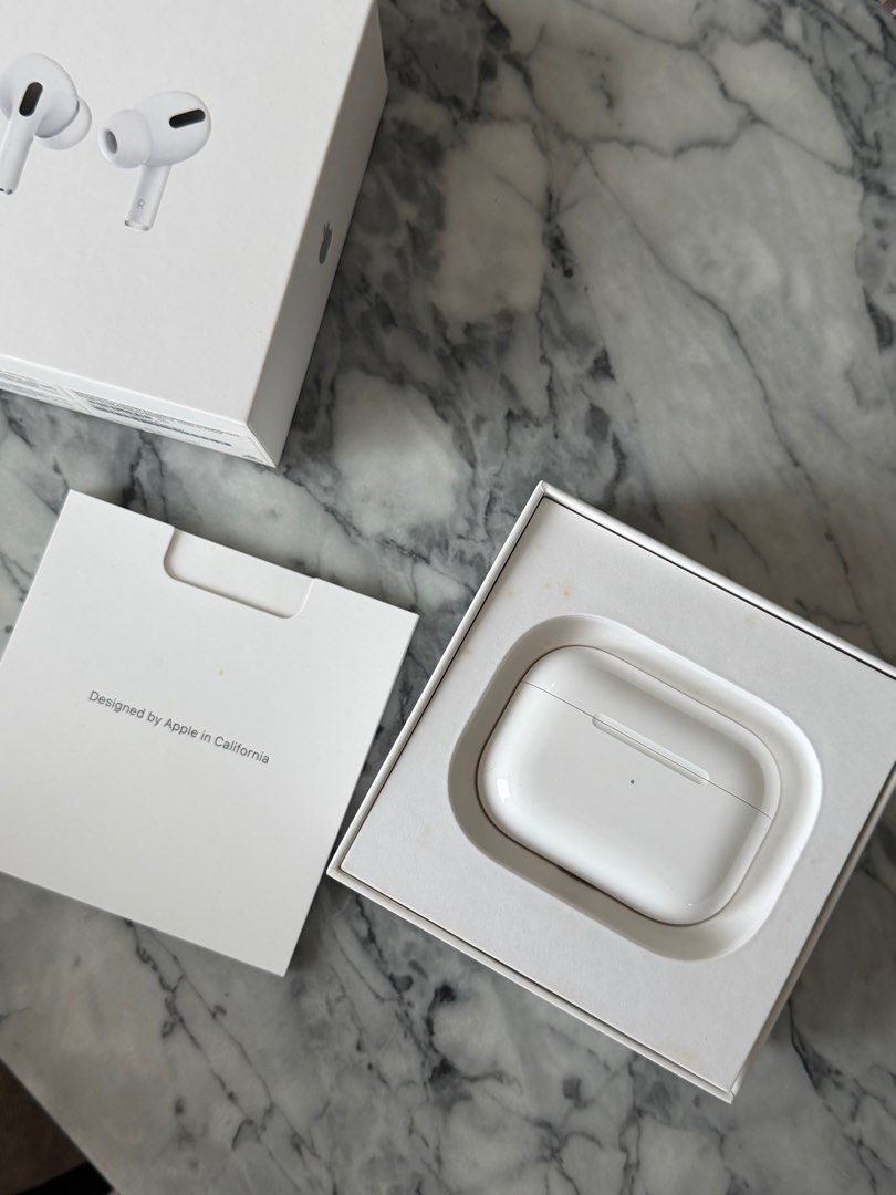 Apple AirPods Pro (Category: Earphones) located in Cebu City. Submitted by fornewhomies (Listing ID 1413946021, Image 3). Description: - Apple AirPods Pro with charging case - Includes original box - Includes charging cable - Includes documentation - White earphones and charging case.