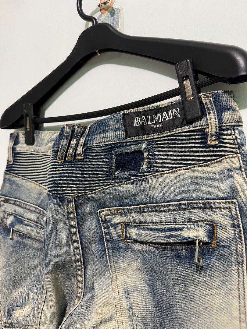 Balmain Biker Jeans Size 32 (Category: Jeans) located in Sorsogon. Submitted by jovert_23alviz (Listing ID 1414052456, Image 3). Description: - Balmain biker jeans - Size 32 32-34 - Distressed detailing - Ribbed panels (knees & back) - Zipper pockets - Button closure - Made in Japan - Length: 37 - Hem: 6.5.