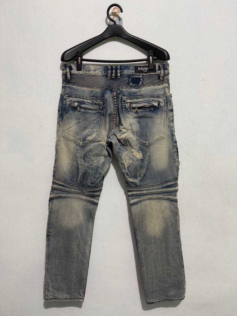 Balmain Biker Jeans Size 32 (Category: Jeans) located in Sorsogon. Submitted by jovert_23alviz (Listing ID 1414052456, Image 2). Description: - Balmain biker jeans - Size 32 32-34 - Distressed detailing - Ribbed panels (knees & back) - Zipper pockets - Button closure - Made in Japan - Length: 37 - Hem: 6.5.