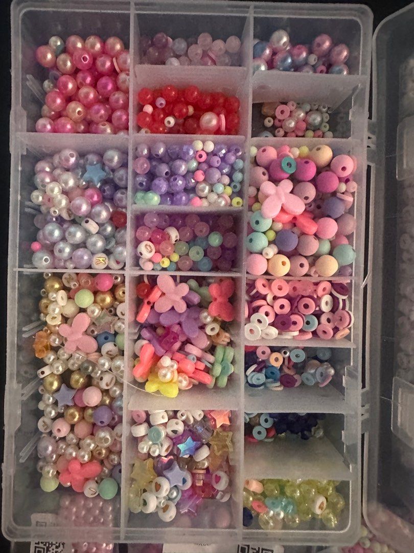 Beads Set (Category: Craft Supplies & Tools) located in Quezon City. Submitted by ak.stt (Listing ID 1413881473, Image 2). Description: - TAKE ALL BEADS SET -Massive bead collection for jewelry making (costs 2k+) - Includes round, star, flower, and letter beads. - Comes with a clear organizer box. - Includes a bag of alphabet beads. - Additional elastic string for easy crafting -Still negotiable for sure buyer.