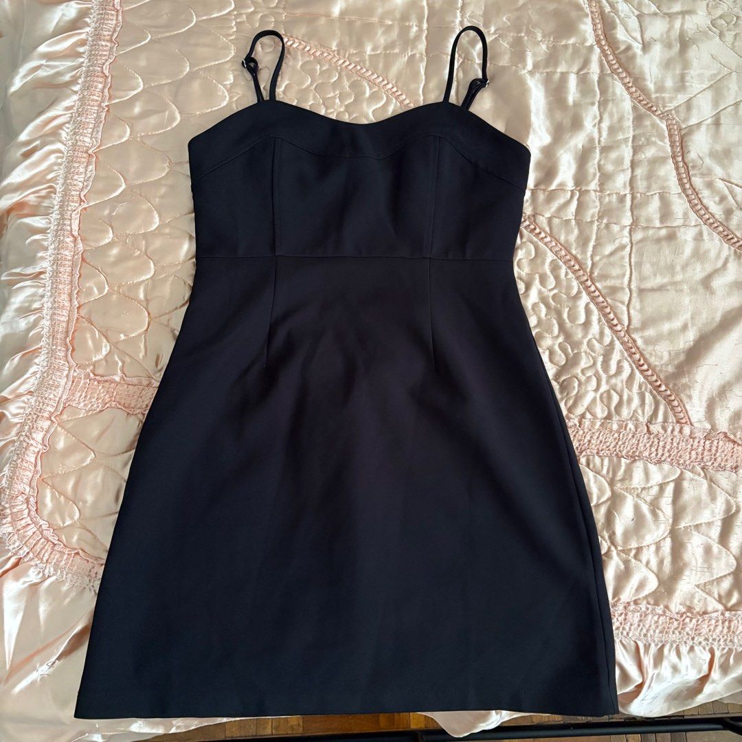 Black Spaghetti Strap Dress (Category: Dresses) located in Las Pinas. Submitted by slowcircle (Listing ID 1413950500, Image 2). Description: - Black spaghetti strap dress - Sweetheart neckline - Fitted bodice - Slightly flared skirt - Ruched back panel - Side zipper closure - Made of smooth, woven fabric.