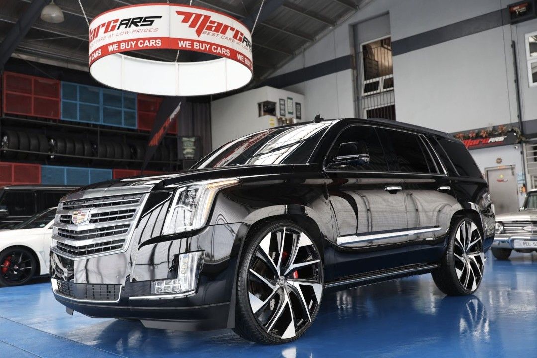 Cadillac Escalade Platinum SWB Auto (Category: Used Cars) located in Quezon City. Submitted by marcars_trading (Listing ID 1413873639, Image 3). Description: CALL NOW FOR INQUIRIES! CALL: 0917-5123333/89213333 2018 Cadillac ESCALADE Platinum SWB 4.980M (neg) trade in ok! "GOOD as BRANDNEW! IMMACULATE, VERY FRESH & PRESERVED Condition! Must see to believe & compare!" 1.5 MILLION worth of SET UP & ACCESSORIES - 28inch LEXANI Ghost Wheels - Brandnew