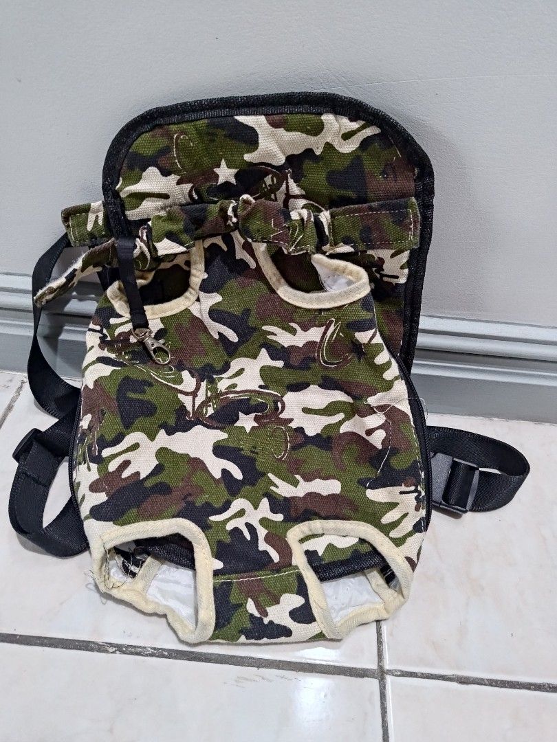 Camouflage Pet Carrier (Category: Homes & Other Pet Accessories) located in San Fernando. Submitted by masterambrose13 (Listing ID 1414049787, Image 1). Description: pet carrier for you furry pets. size Small to slightly medium.