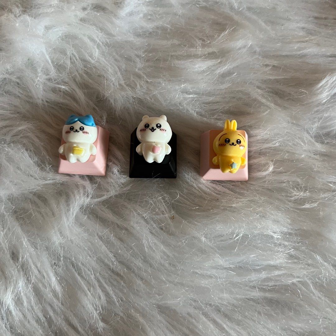 chiikawa Keycaps Set (Category: Computer Keyboard) located in Malolos. Submitted by babebunzz (Listing ID 1414027483, Image 1). Description: - Adorable keycaps with cute animal designs. - Includes a cat with a blue bow, a white bear, and a yellow bunny. - Each keycap has a unique design and color. - Perfect for customizing your keyboard. - Add a touch of fun to your setup..