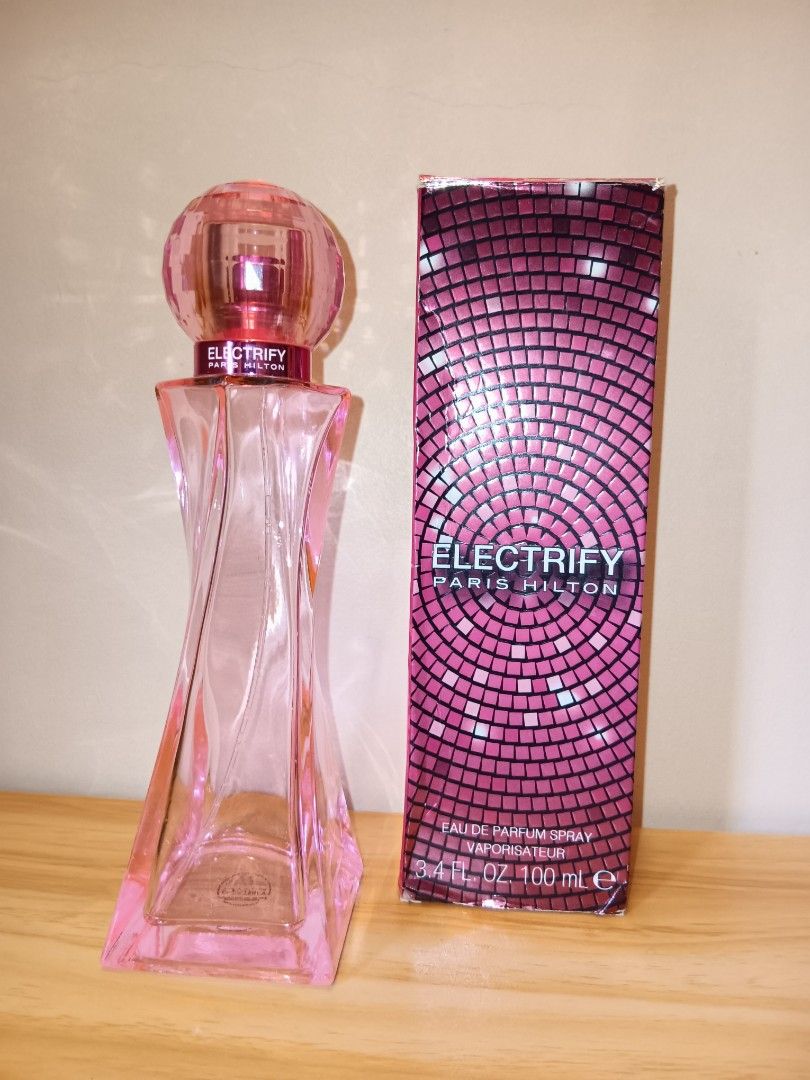 EMPTY BOTTLE - Paris Hilton Electrify Eau de Parfum 100ml (Category: Fragrance & Deodorants) located in Manila. Submitted by declutteraf (Listing ID 1413904306, Image 2). Description: Negotiable Empty Paris Hilton Electrify Eau de Parfum. 100ml bottle. Eau de Parfum spray..