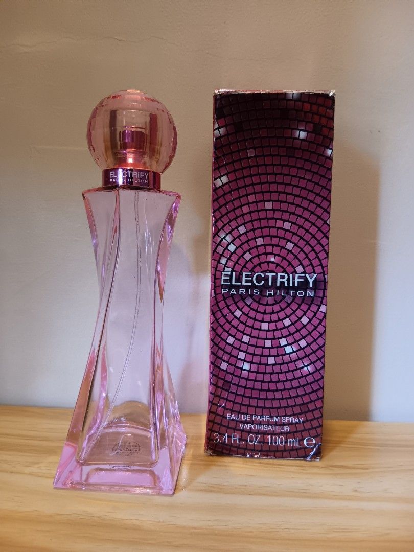 EMPTY BOTTLE - Paris Hilton Electrify Eau de Parfum 100ml (Category: Fragrance & Deodorants) located in Manila. Submitted by declutteraf (Listing ID 1413904306, Image 1). Description: Negotiable Empty Paris Hilton Electrify Eau de Parfum. 100ml bottle. Eau de Parfum spray..