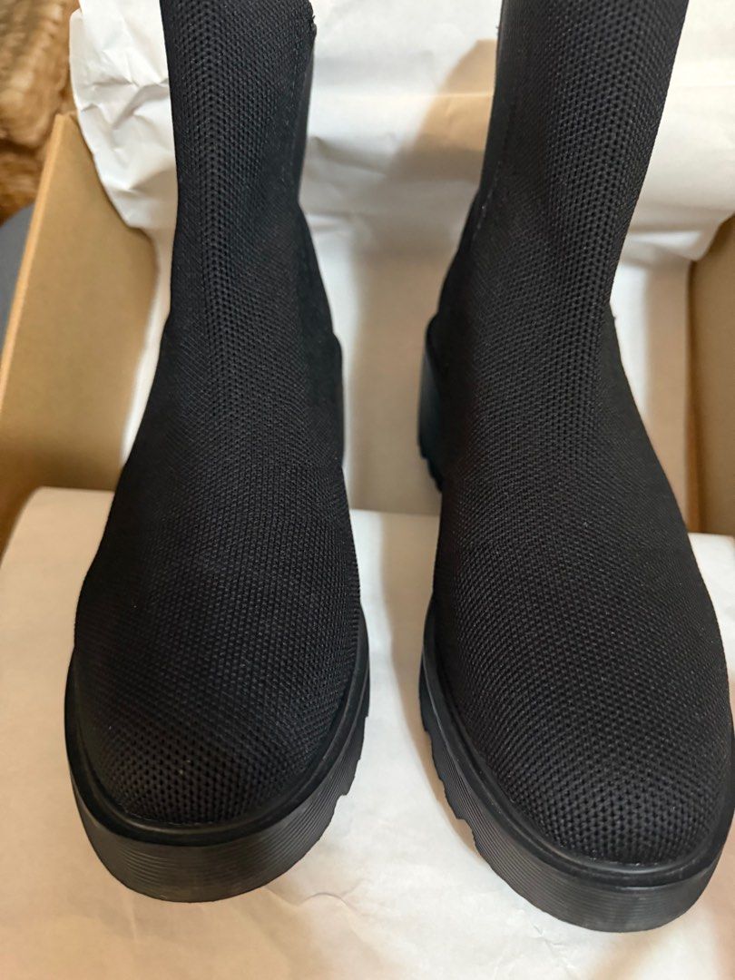 Everly Black Water RPT Boots EU38 (Category: Boots) located in Pasig City. Submitted by mswise (Listing ID 1413879564, Image 3). Description: - Black Everly Boots - Size: EU38, US 7, cm 24, UK 4.5 - Material: Knit - Includes original receipt from SM Megamall (November 18, 2023) - Original Price: ₱13,159.00.