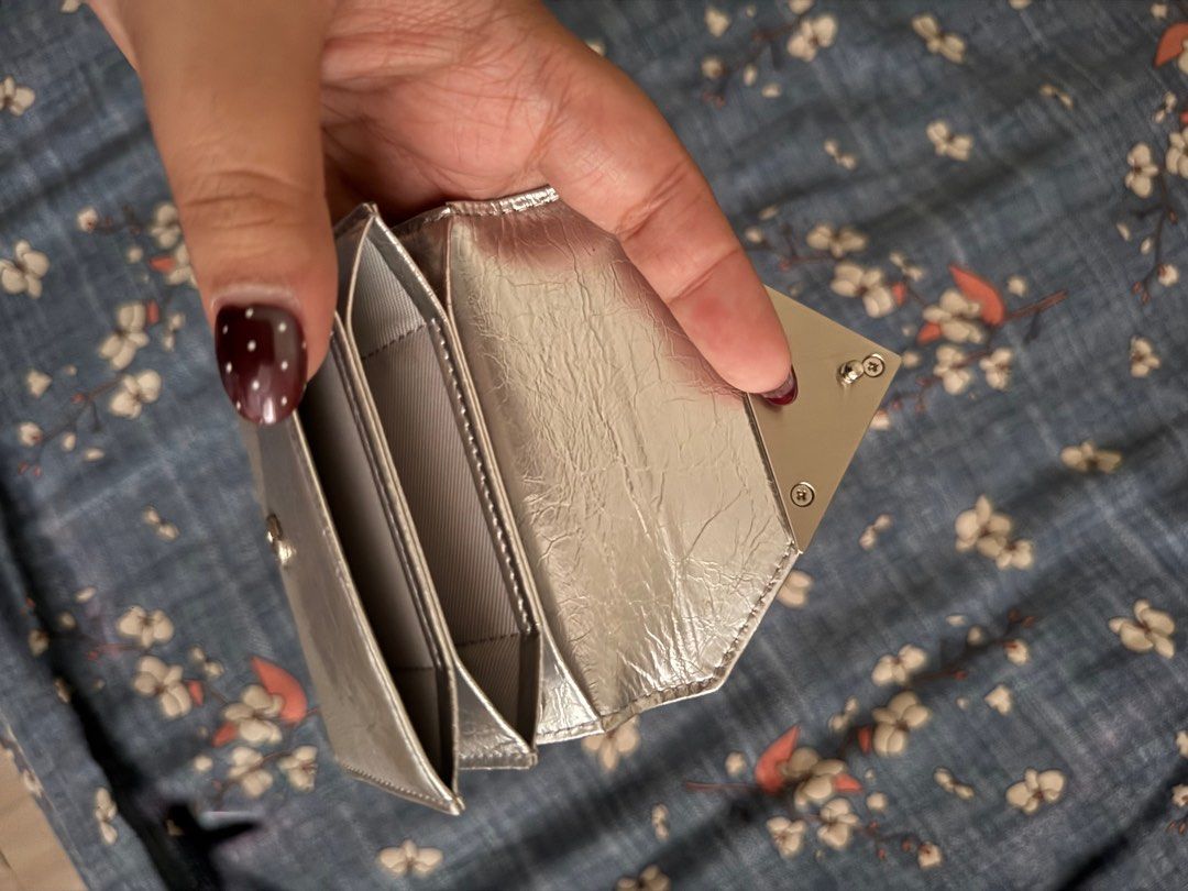 fennec crinkle accordion triangle wallet (silver) (Category: Luxury Bags & Wallets) located in Lipa City. Submitted by aye.nah (Listing ID 1413939496, Image 3). Description: ᝰ fennec accordion wallet triangle [ bought fr pasabuy fr my cousin that went to korea ] — ₱2,650 + sf & pf • price is still nego IF SURE BUYER • good condition ! x sensi. has minor flaws check pictures • has fennec bag, dustbag and envelope rfs: decluttering PM ME IF INTERES