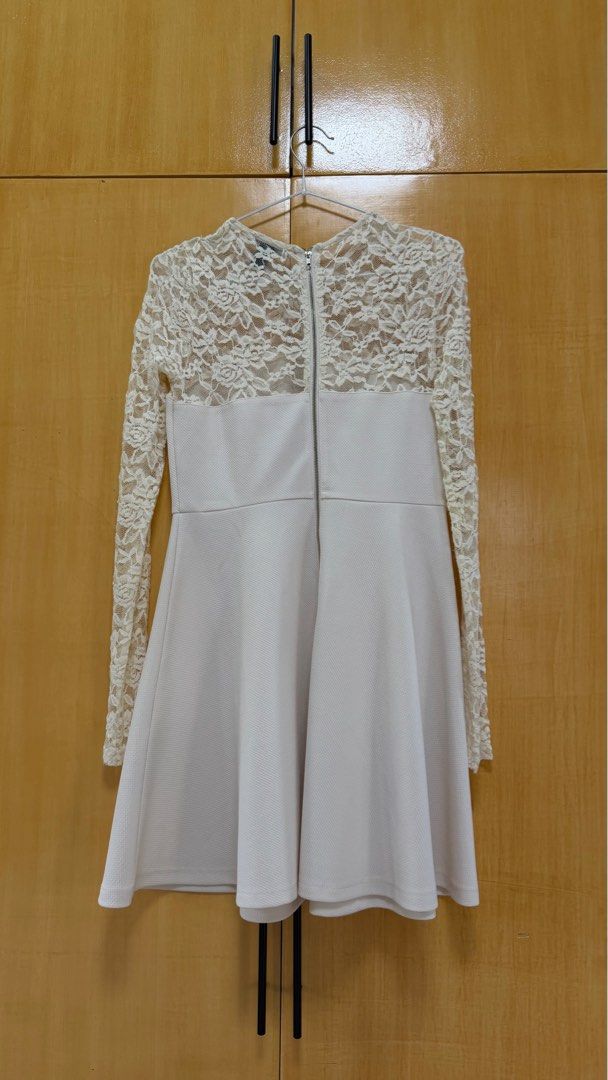Forever 21 Lace Sleeve Dress - Medium (Category: Dresses) located in Binan City. Submitted by gia.declutters (Listing ID 1413898133, Image 2). Description: - Lace sleeve design - Fit-and-flare silhouette - Size: Medium - Back zipper closure - Made in China L 33 W 14.
