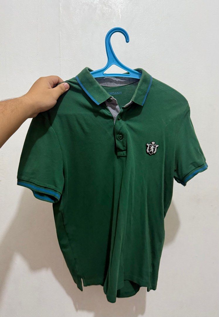 Giordano Polo Shirt - Size S (Category: Tshirts & Polo Shirts ) located in Quezon City. Submitted by artdeclutters_ (Listing ID 1413938370, Image 1). Description: - Giordano polo shirt - Size: S - Color: Green with blue trim - Features: Tapered fit, emblem on chest, three-button placket - Condition: Good DM for Dimensions Rfs: Not using anymore, decluttering MoP: GCash/Cash Courier: To be booked by buyer/pick-up.