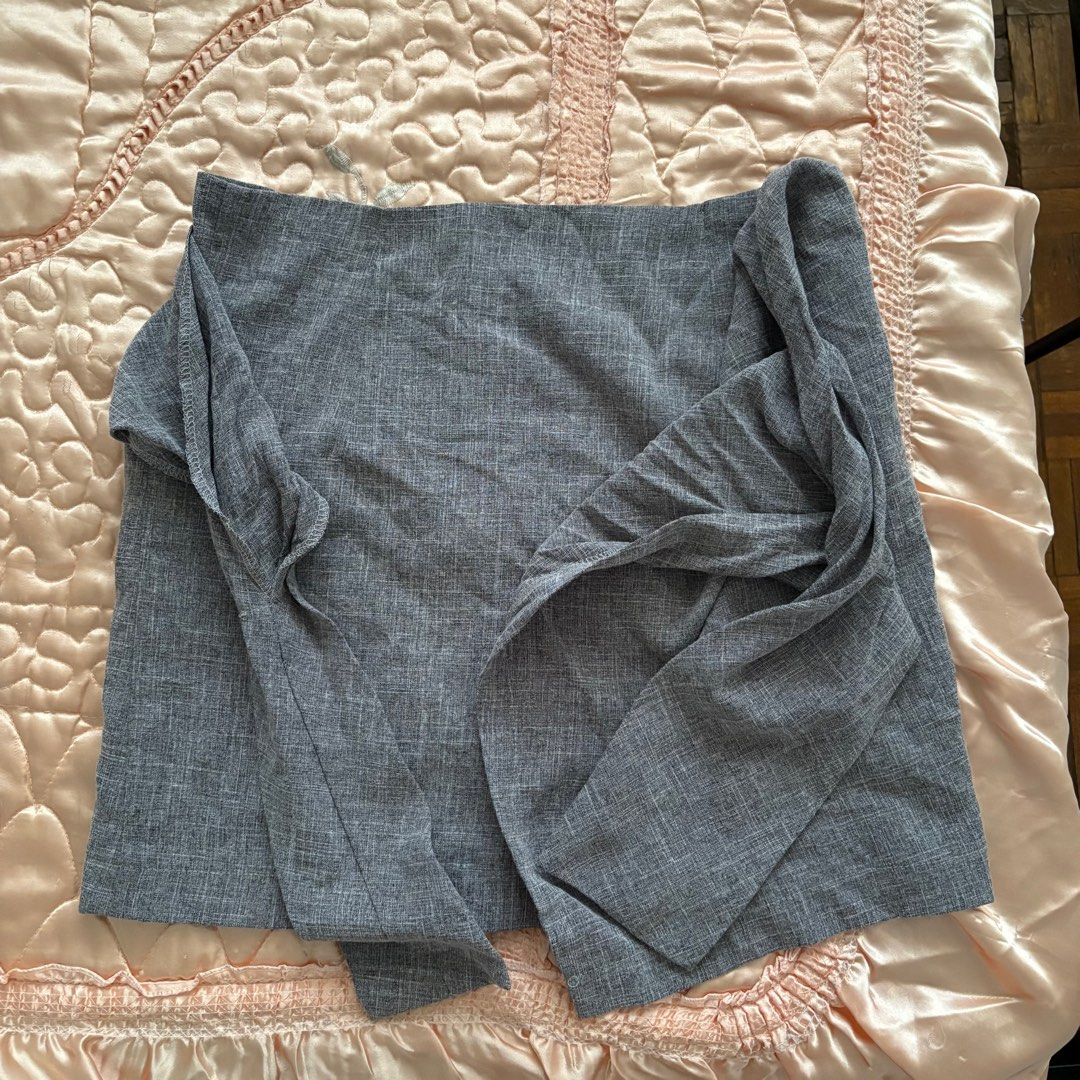 Gray Wrap Skirt (Category: Skirts) located in Las Pinas. Submitted by slowcircle (Listing ID 1413950266, Image 2). Description: - Stylish gray wrap skirt - Unique knot detail - Back zipper closure - Fully lined - Perfect for a chic look High Quality .