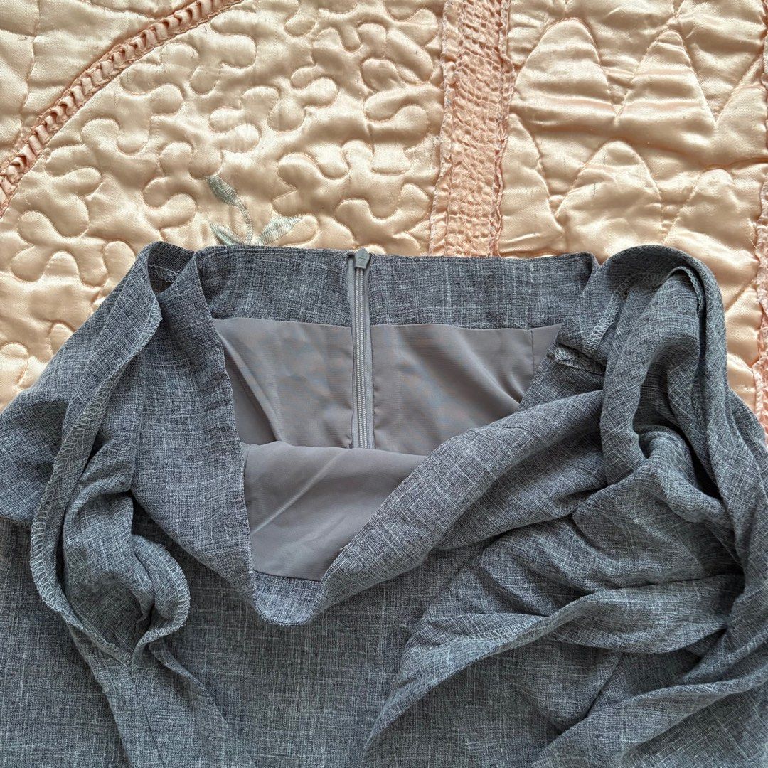 Gray Wrap Skirt (Category: Skirts) located in Las Pinas. Submitted by slowcircle (Listing ID 1413950266, Image 3). Description: - Stylish gray wrap skirt - Unique knot detail - Back zipper closure - Fully lined - Perfect for a chic look High Quality .