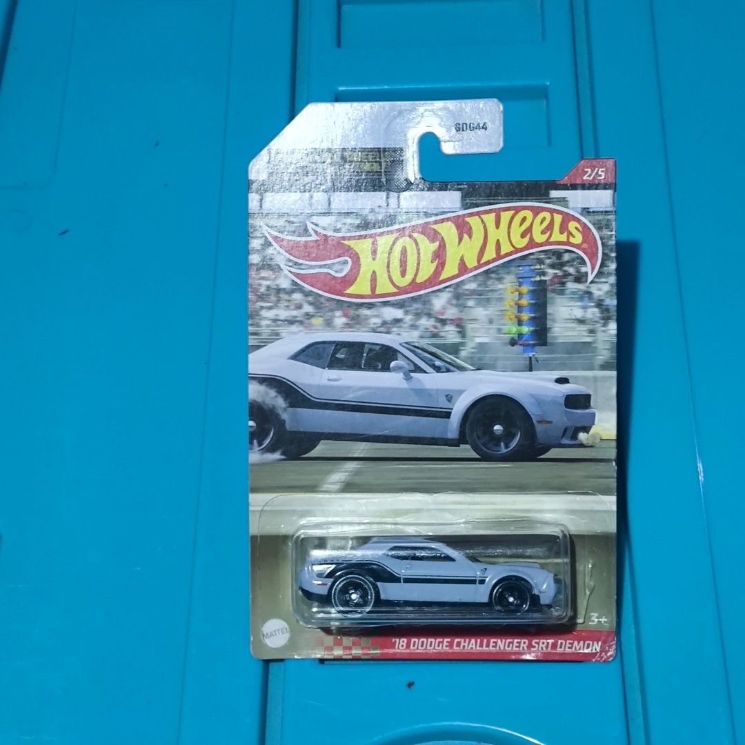 Hot Wheels '18 Dodge Challenger SRT Demon (Category: Vehicle & Diecast Models) located in Los Banos. Submitted by Kiwi83 (Listing ID 1413959705, Image 1). Description: - Hot Wheels '18 Dodge Challenger SRT Demon - Opened -Card has soft corners Payment: GCash or upon meetup Meetup: BFAR 4A Regional Fisheries Training Center at Los Baños Laguna Courier: LBC/JRS/Lalamove (Buyer shoulders shipping fee).