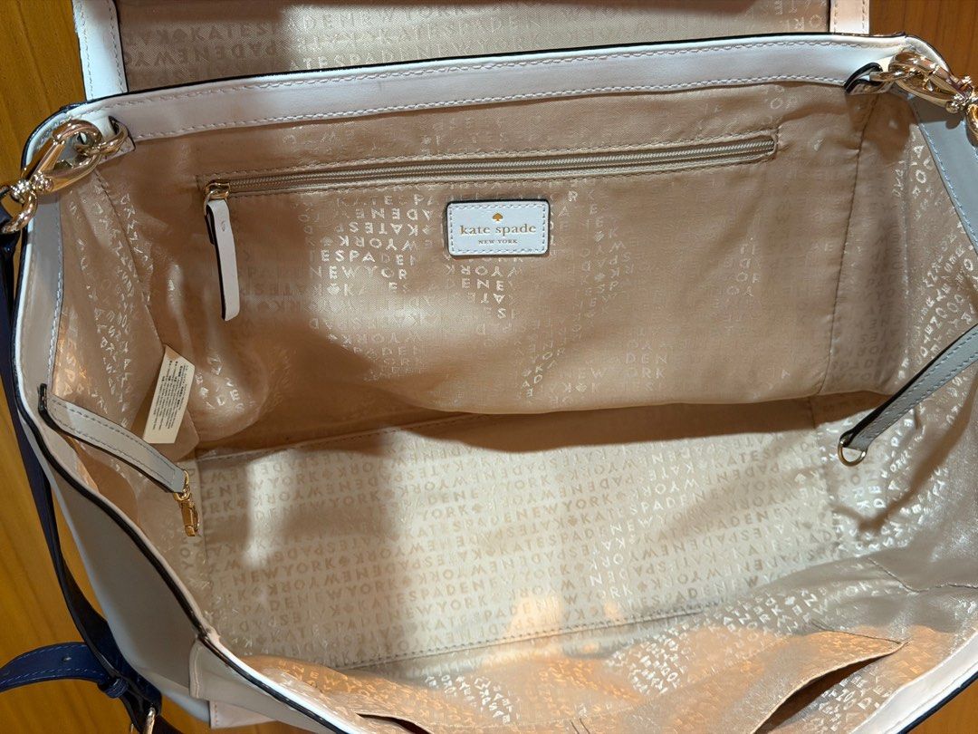 Kate Spade Magnolia Park Large Bag (Category: Cross-body Bags) located in Iloilo. Submitted by chringgg (Listing ID 1414001866, Image 3). Description: •bought from their website last 2017 •used a few times as my work bag but it was too big for my liking •has a small stain (please see photos) but other than that everything is okay. insides are clean and corners are okay SHIPPING FEE IS TO BE SHOULDERED BY BUYER :) .