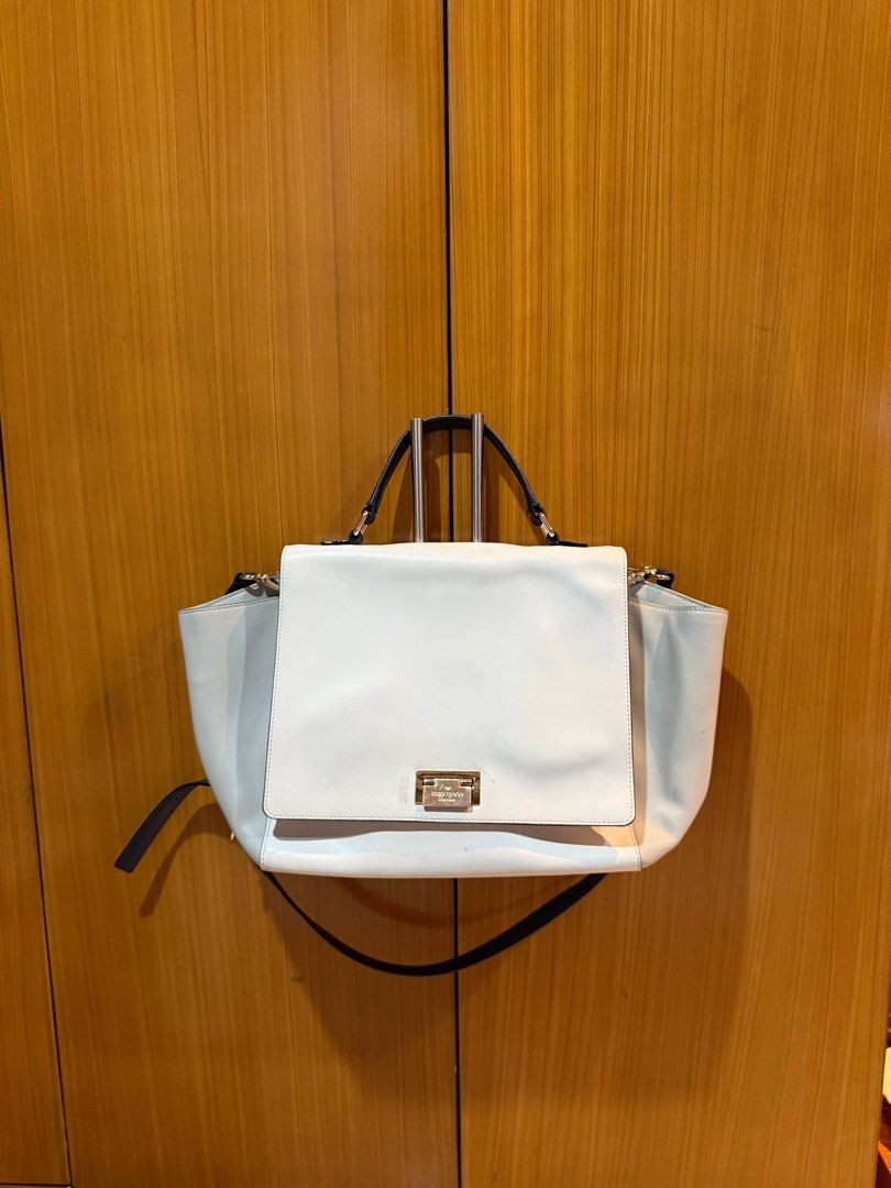 Kate Spade Magnolia Park Large Bag (Category: Cross-body Bags) located in Iloilo. Submitted by chringgg (Listing ID 1414001866, Image 1). Description: •bought from their website last 2017 •used a few times as my work bag but it was too big for my liking •has a small stain (please see photos) but other than that everything is okay. insides are clean and corners are okay SHIPPING FEE IS TO BE SHOULDERED BY BUYER :) .