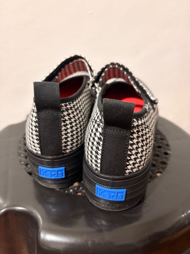 Keds Houndstooth Mary Jane Shoes (Category: Sneakers) located in Mandaluyong City. Submitted by rshvm (Listing ID 1413931546, Image 3). Description: - Keds Mary Jane shoes - Houndstooth pattern - Black rubber sole - Strap closure - Red interior - Keds logo visible - Pull tab at the back - Size: US 6, EUR 36, CM 24 - No box - Bought last October 2025 Rfs: Decluttering.