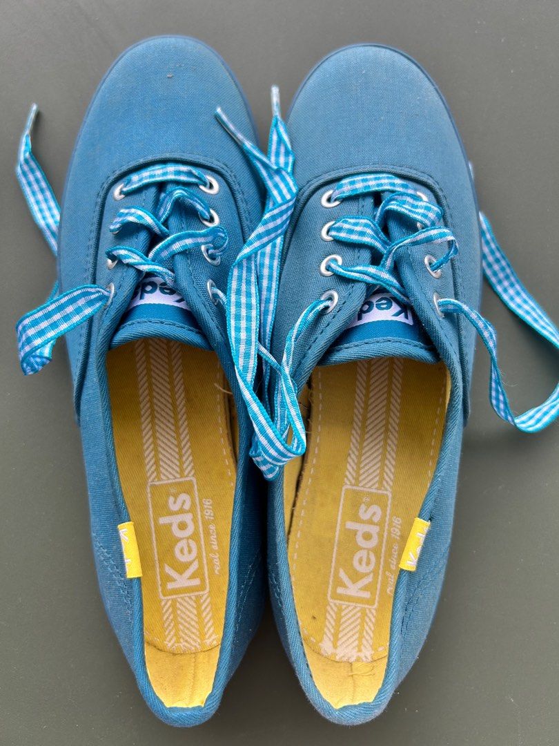 Keds Teal Blue Sneakers with Gingham Laces (Category: Sneakers) located in Quezon City. Submitted by iamdaisyduck (Listing ID 1413935037, Image 1). Description: ~ Blue canvas upper with white sole ~ Yellow insole ~ Unique gingham laces ~ Keds logo on heel and insole ~ Sample item, bought at Keds Outlet ~ used once ~ Size 6.