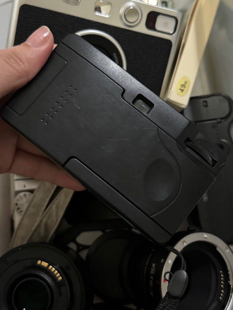 Kodak M35 Film Camera (Category: Cameras) located in Quezon City. Submitted by officegirlph (Listing ID 1413862982, Image 3). Description: - Kodak M35 film camera (mint green) - Includes camera and strap - Lens: 28mm - Focus range: 0.1m Used once but with minimal scratches due storage (stored in dry box) Price nego.