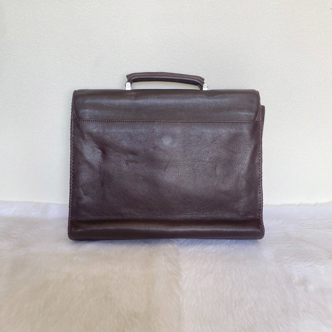 Lancel Brown Leather Document Bag Briefcase (Category: Briefcases) located in Cebu City. Submitted by posh_avenue888 (Listing ID 1414013960, Image 3). Description: In very good condition showing light signs of wear. Crafted in genuine leather. 100% authentic or your money back!!! Measurements (taken flat - approximate): Length: 14 inches; Height: 12 inches; Depth: 2.5 inches. .