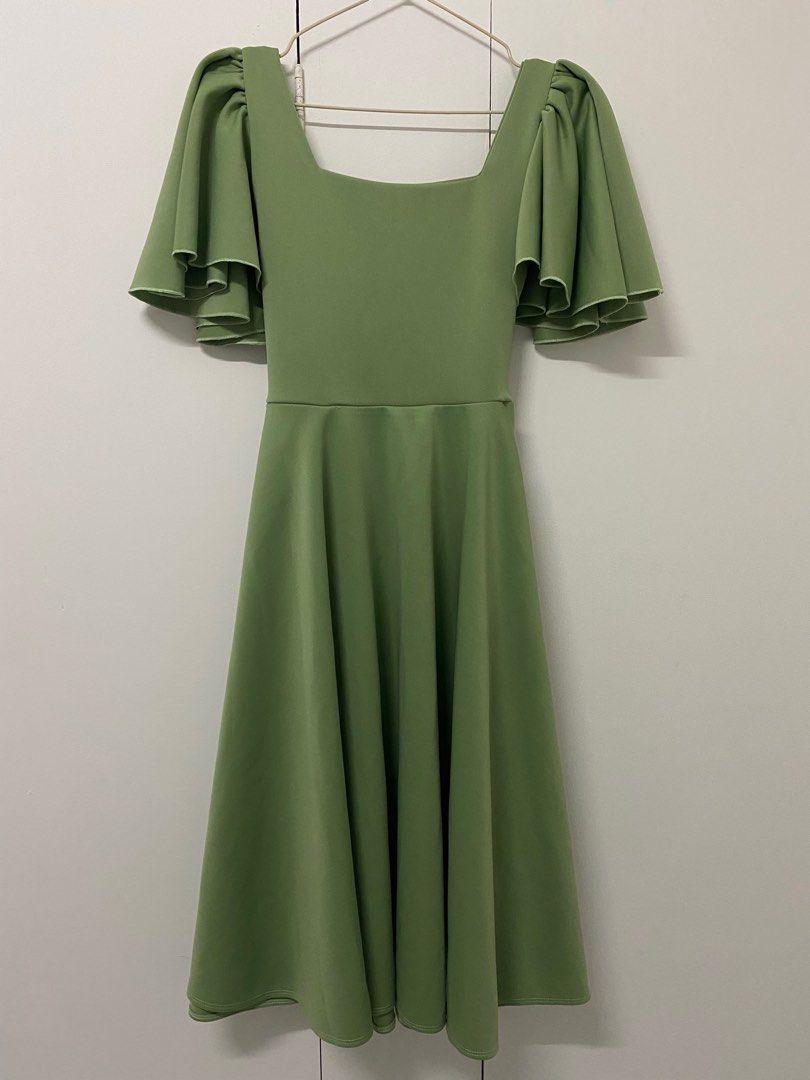 Maya Dress - Avocado Green - Freesize (Category: Dresses) located in Penaranda. Submitted by siobhanslittlecloset (Listing ID 1413982366, Image 1). Description: - Maya dress in avocado green - Features a square neckline and flutter sleeves - Fitted bodice with a flared skirt - Freesize fit, suitable for XL sizes - Perfect for various occasions.