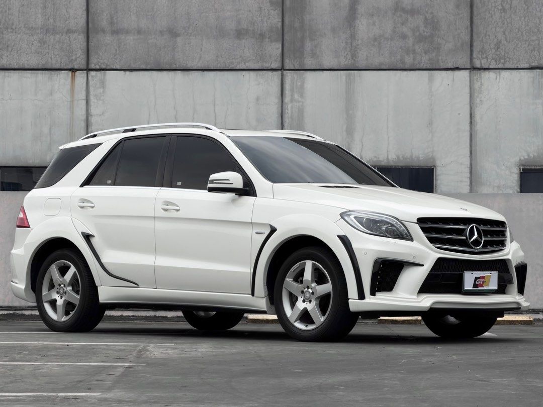 Mercedes-Benz ML350 4Matic (A) (Category: New Cars) located in Pasig City. Submitted by gtautoph (Listing ID 1413876792, Image 2). Description: ⬛️🟥🟨 FOR SALE 🟨🟥⬛️ 2012 Mercedes Benz ML350d AMG 4MATIC All-Wheel Drive 3.0-liter V6 Blue Efficiency Turbo Diesel 28k Kilometers ONLY WALD Black Bison Edition 7-speed Automatic Transmission Leather Interior Retractable Cargo Cover Plate # Ending: 8 📩 DM for further assistance 📍 Location: Ortigas, Pa