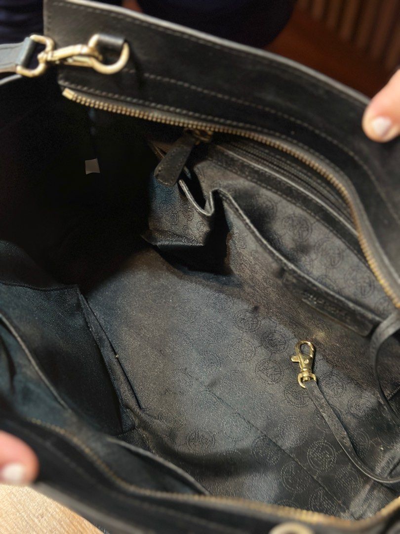 MK Selma Large (Category: Luxury Bags & Wallets) located in Quezon City. Submitted by _mgnmn (Listing ID 1413982415, Image 3). Description: Tarnishing zipper and metal hardware on straps Back panel, slightly deformed Overall, the bag it self is in good condition.