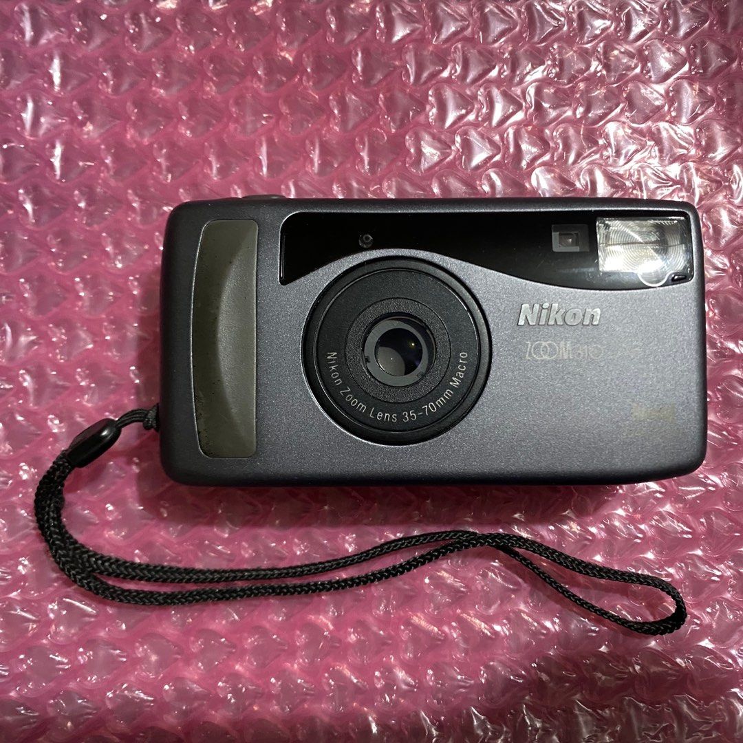 Nikon Zoom 310 AF QD (Category: Cameras) located in Antipolo. Submitted by k_renee (Listing ID 1409048991, Image 2). Description: Details: •Excellent working condition •PM for sample photos •9/10 cosmetics (slight LCD bleeding) •Working flash Features: • Auto Flash, Flash On/Off, Infinity Focus, Auto Flash with slow sync •Self timer •LCD Display •Panorama • Quartzdate (date stamp) •DX Coded •Battery: 1 CR123A PLEASE NOTE: - last used early 2025 -