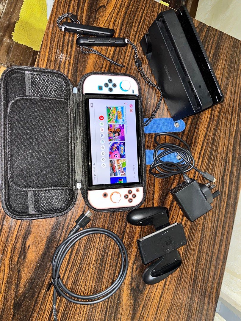 Nintendo Switch 1 (Category: In-Game Products) located in Imus. Submitted by cantero.stephanie0243356 (Listing ID 1413957498, Image 2). Description: no box pero kumpleto pa yung gamit in good condition kasama pati case pati mga games na nabili purchase in Game Extreme August 2025 RSF: hindi nagagamit busy sa work impulsive buying lang hehe.