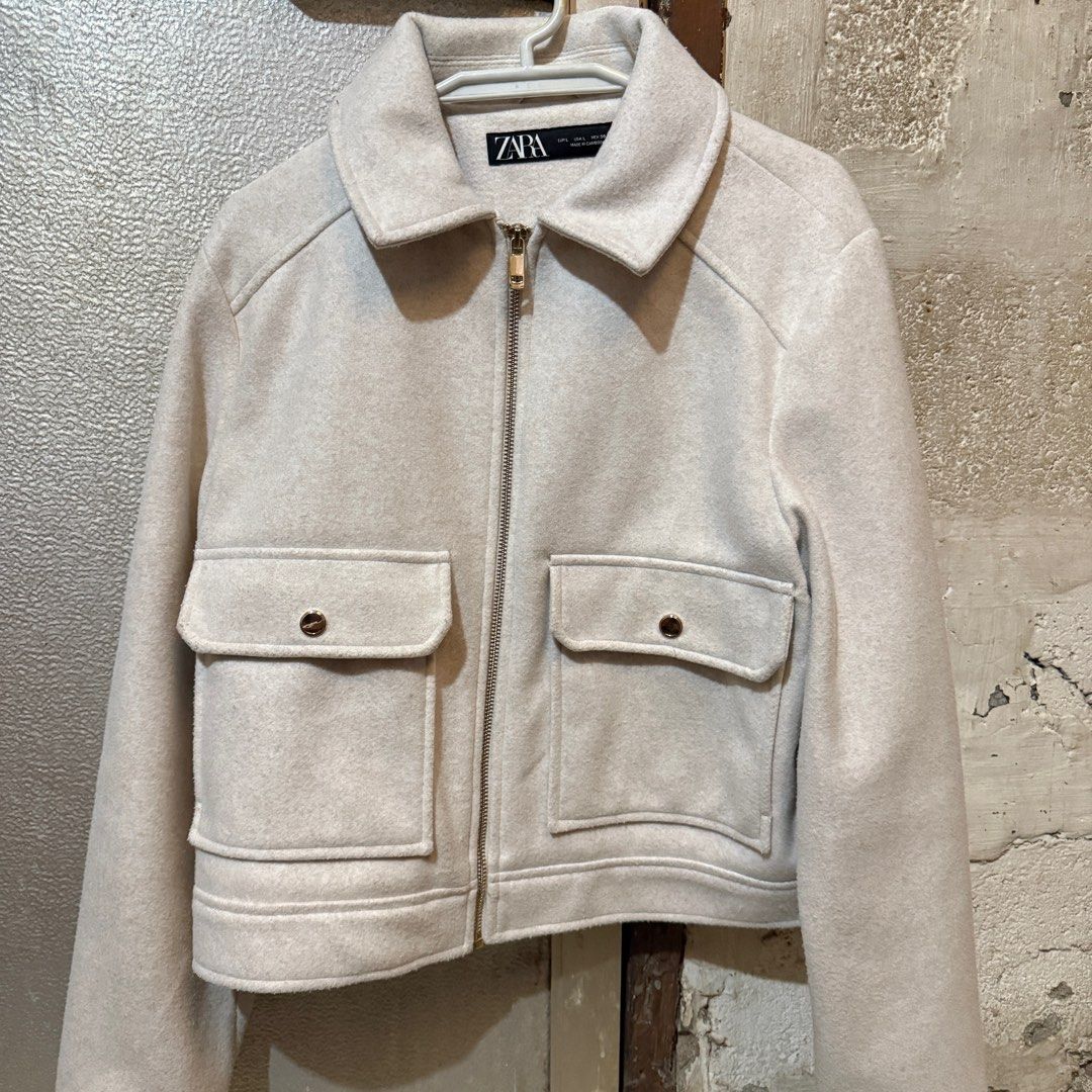 Original Zara Soft Zip-up Jacket in Ecru (Category: Coats, Jackets and Outerwear) located in Antipolo. Submitted by bern.clo (Listing ID 1414012904, Image 1). Description: • Large on tag • original mall bought • 10/10 condition • only used once • super nice and comfy.