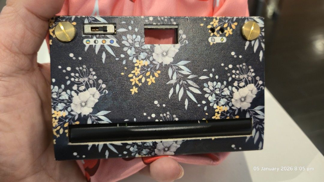 Paper Shoot Camera - Floral Design (Category: Cameras) located in Mandaluyong City. Submitted by iamkornik (Listing ID 1413926769, Image 2). Description: Papershoot Camera - Floral design Paper Shoot camera - Black body with floral pattern and gold accents - lens included - Rechargeable Battery included.