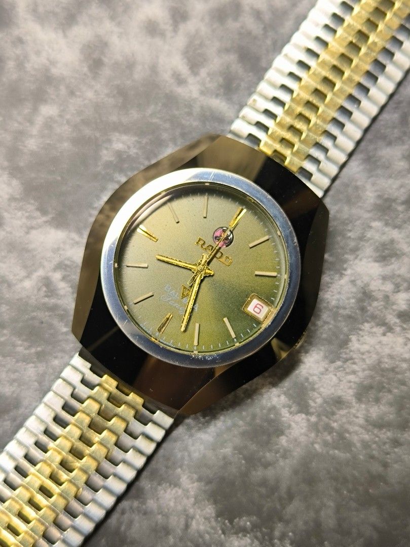 Rado Diastar Watch (Category: Luxury Watches) located in Pasay City. Submitted by cassiuss (Listing ID 1413982374, Image 1). Description: - Vintage Rado Balboa V - Gold and silver-tone bracelet - Green dial with gold-tone hands and markers - Date display at 3 o'clock - Case size 35.5mm - Presentable.