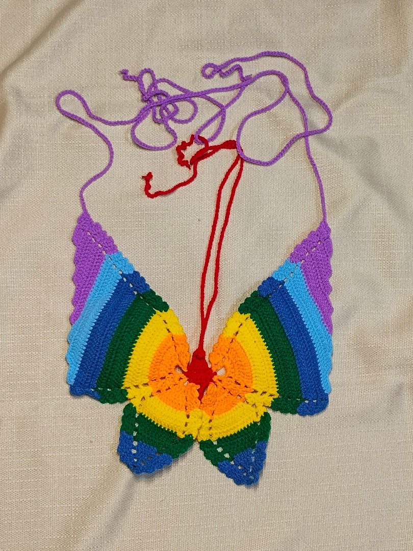 Rainbow Butterfly Crochet Top (Category: Sleeveless) located in Malabon City. Submitted by lunapie (Listing ID 1413940313, Image 2). Description: - Handmade crochet butterfly - Vibrant rainbow colors - Wings approximately 13 inches wide - Perfect for decoration or as a unique gift.