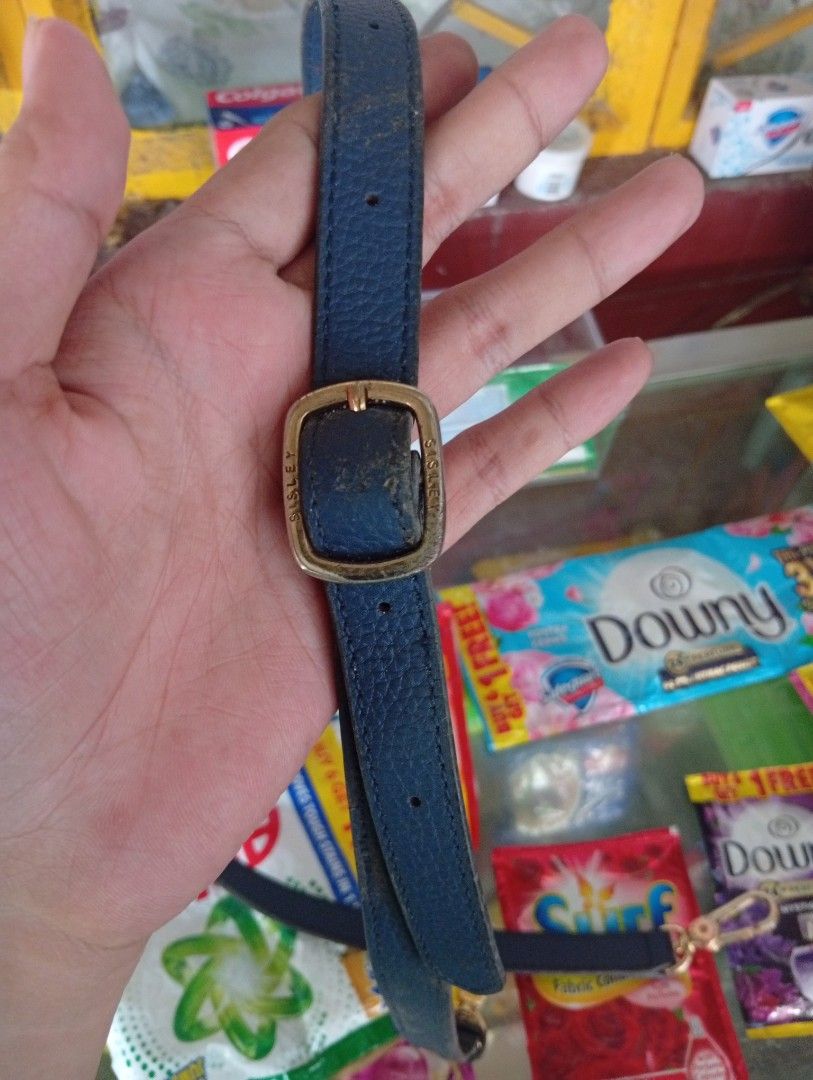Sisley Authentic Blue Leather Bag Strap (Category: Cross-body Bags) located in Manila. Submitted by hermosa_la_tienda (Listing ID 1413880126, Image 2). Description: - Blue leather bag strap - Gold-hardware - buckle faded - Includes buckle and clasps - Textured leather material - Compatible with various bags source: online lived selling .