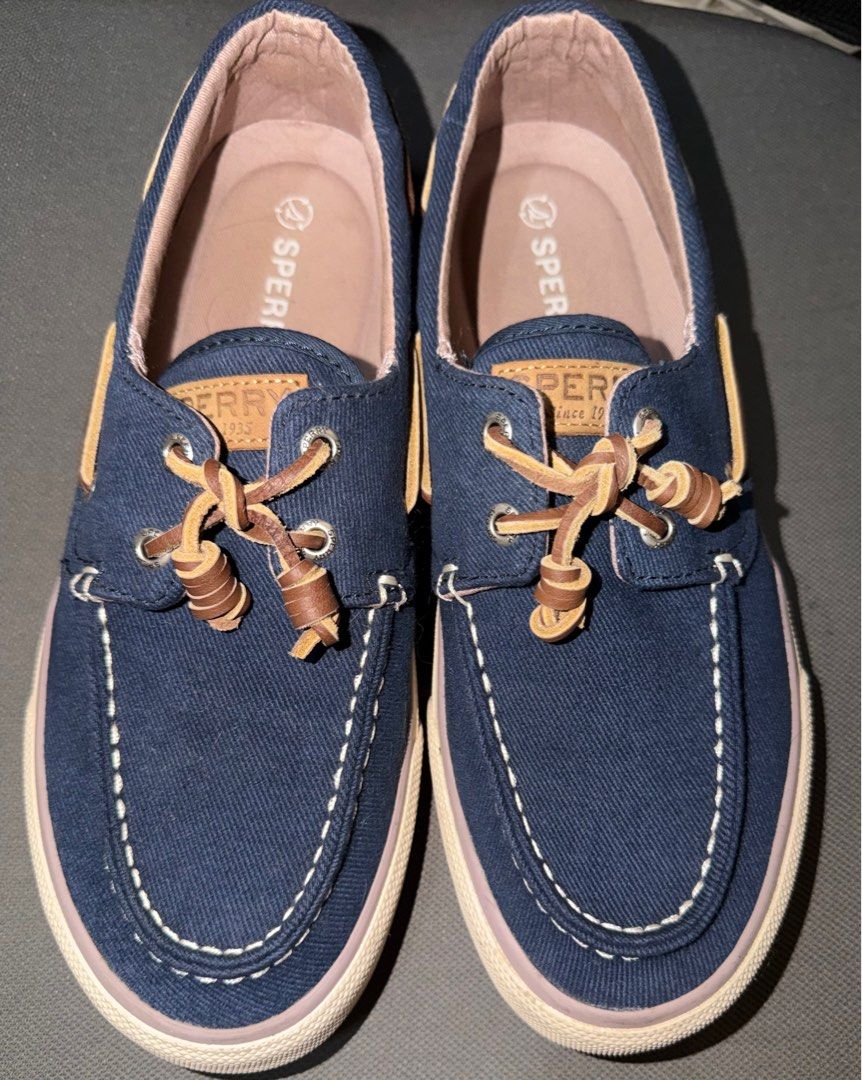 Sperry STS25537 Boat Shoes - Navy (Category: Casual Shoes) located in Pasig City. Submitted by mswise (Listing ID 1413897876, Image 2). Description: Navy blue Sperry boat shoes. Features a classic boat shoe design with leather laces and a white sole. The shoes have the Sperry logo on the insole and the back of the shoe. Made in Vietnam. Size 8.5 US, 7.5 UK, 41.5 EUR, and 26.5 CM..