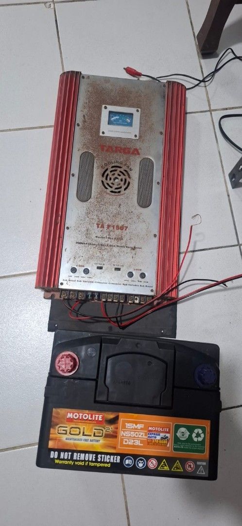 Targa TA F1507 Car Amplifier (Category: Soundbars, Speakers & Amplifiers) located in Cavite. Submitted by lonchel1571206 (Listing ID 1413906461, Image 3). Description: - Targa TA F1507 car amplifier - Cooling fan included - Built-in meter - Multiple input and output channels - Bass boost feature - Red and silver color scheme - Designed for car audio systems battery included 80% health.